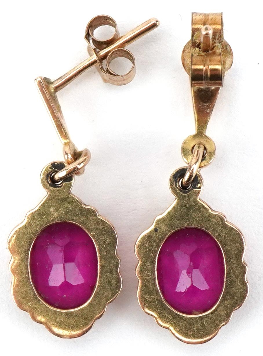 Pair of 9ct gold pink stone drop earrings, each 2.3cm high, total 2.7g - Image 2 of 2