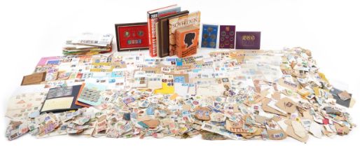 Collection of world stamps and various reference books including The Sovereign, Introduction by