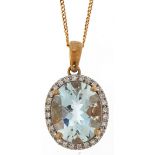 9ct gold aquamarine and diamond cluster pendant on a 9ct gold necklace, 2cm high and 40cm in length,
