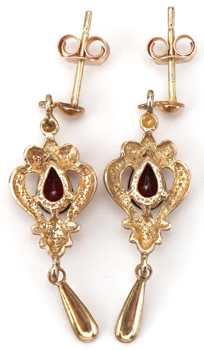 Pair of 9ct gold garnet teardrop earrings, each 3cm high, total 1.9g - Image 2 of 2