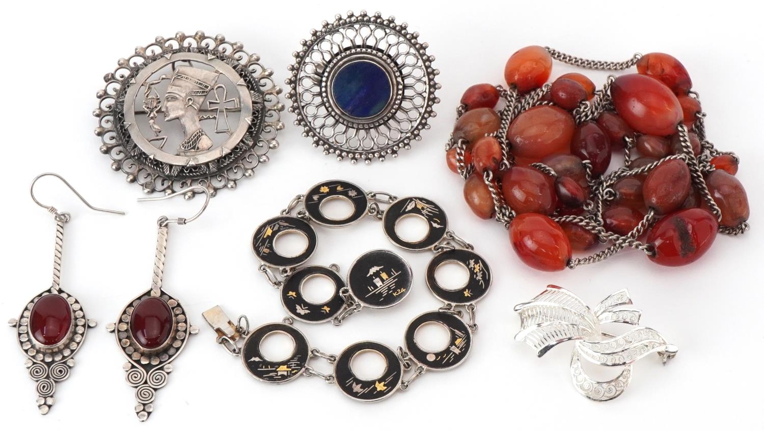 Antique and later silver and white metal jewellery including carnelian necklace and earrings,