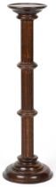 Carved oak torchere, 98cm high