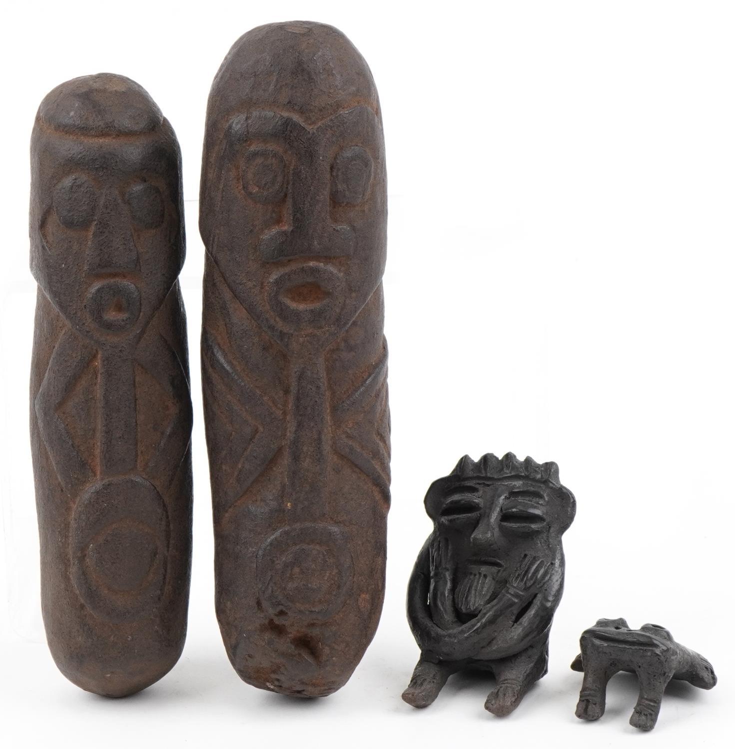 Native American Pre Columbian artefacts including two phallus figures, the largest 26.5cm in length