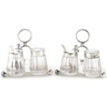 Hukin & Heath, two Victorian silver cruet sets on stand with glass jars, London 1885, each 8cm high,