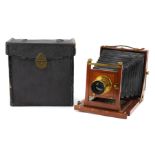 Victorian London Stereoscopic & Co mahogany plate camera with a 7 x 5 brass lens, 21cm x 20cm