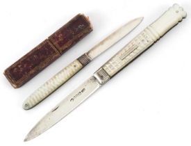 Two Georgian and later mother of pearl flanked silver folding fruit knives, one with tooled