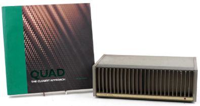 Vintage Quad 405 power amplifier together with a Quad The Closest Approach hardback book by Ken