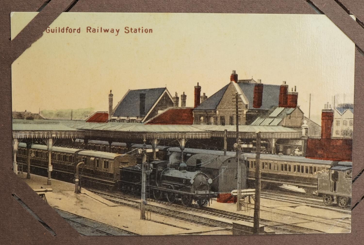 Local interest and railwayana postcards arranged in an album including Eastbourne Railway Station - Image 9 of 13