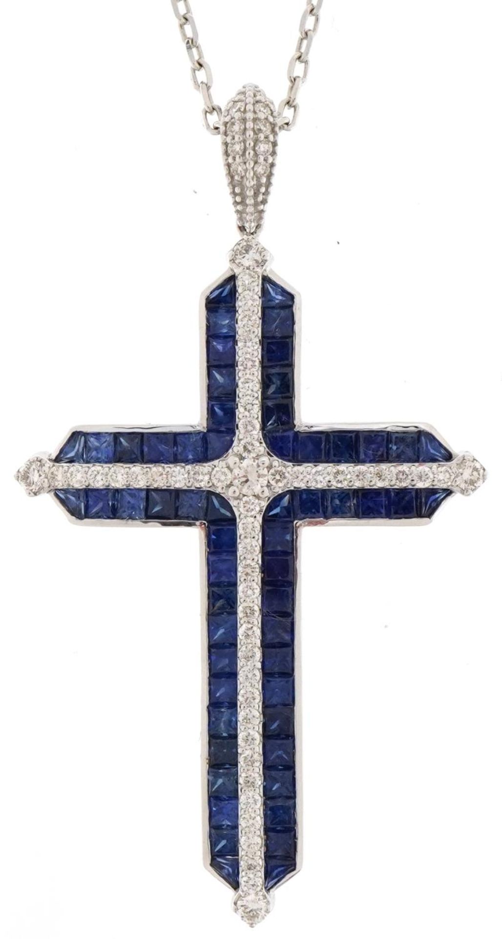 18ct white gold sapphire and diamond cross pendant on an 18ct white gold necklace, total diamond