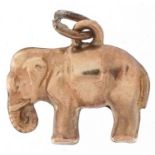 9ct gold charm in the form of an elephant, 1.4cm wide, 0.6