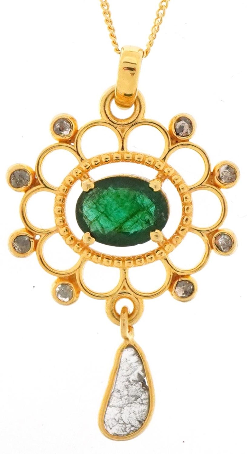 Yellow metal emerald and diamond openwork pendant on a silver gilt necklace, total diamond weight