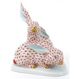 Herend, Hungarian hand painted porcelain group of two fishnet pattern rabbits, numbered 5332, 14.5cm