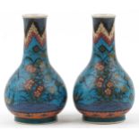 Pair of Japanese Owari shippo porcelain vases enamelled with flowers, each 19cm high