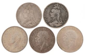 Two Victorian 1889 silver crowns, two George V 1935 silver crowns and a George VI 1937 silver crown
