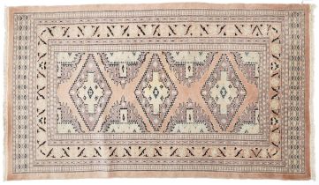 Middle Eastern beige ground rug having an allover floral design, 166cm x 97cm