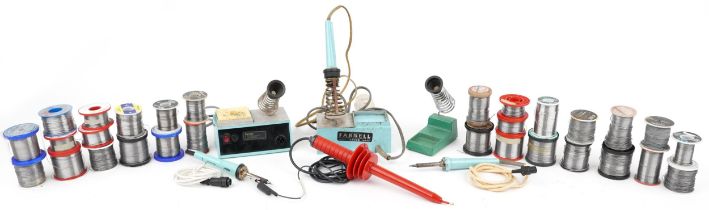 Group of vintage soldering irons and soldering wire including Farnell PU-3D and Farnell PU-2D