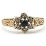 9ct gold sapphire and diamond flower head ring with engraved shoulders, size Q, 2.8g