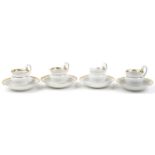 Four Meissen porcelain chocolate cups and saucers with swan neck handles each saucer 14.5cm in