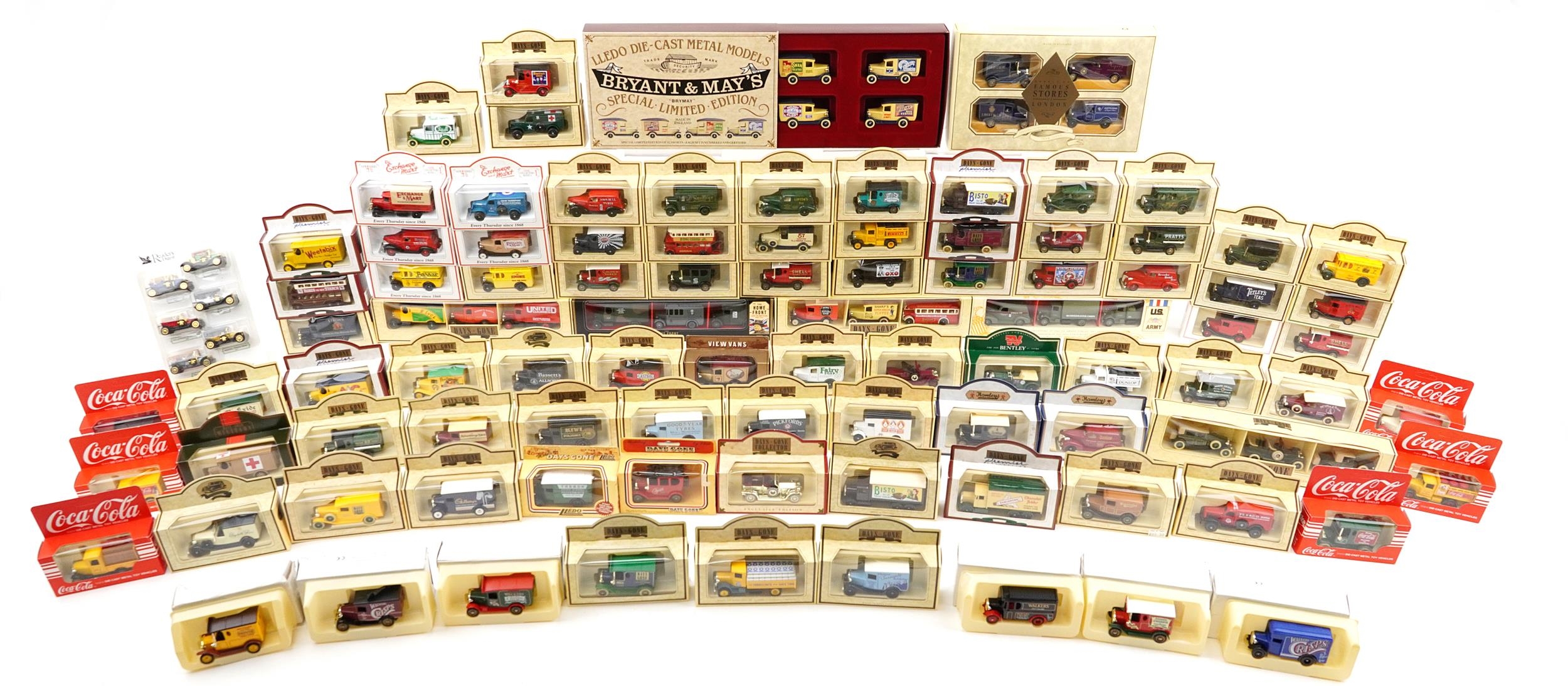 Large collection of diecast vehicles with boxes, some advertising, including Days Gone Ford Model T