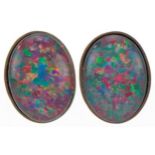 Pair of 9ct gold cabochon opal stud earrings, each 8.5mm high, total 1.2g