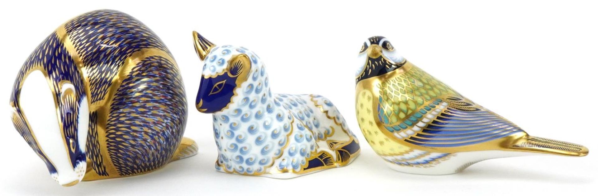 Royal Crown Derby Great Tit, Lamb and Badger paperweights with gold stoppers, the largest 11cm in