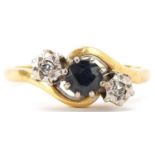 18ct gold sapphire and diamond three stone crossover ring, the sapphire approximately 4.30mm in