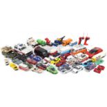 Large collection of model vehicles, some remote controlled, some radio controlled, the largest