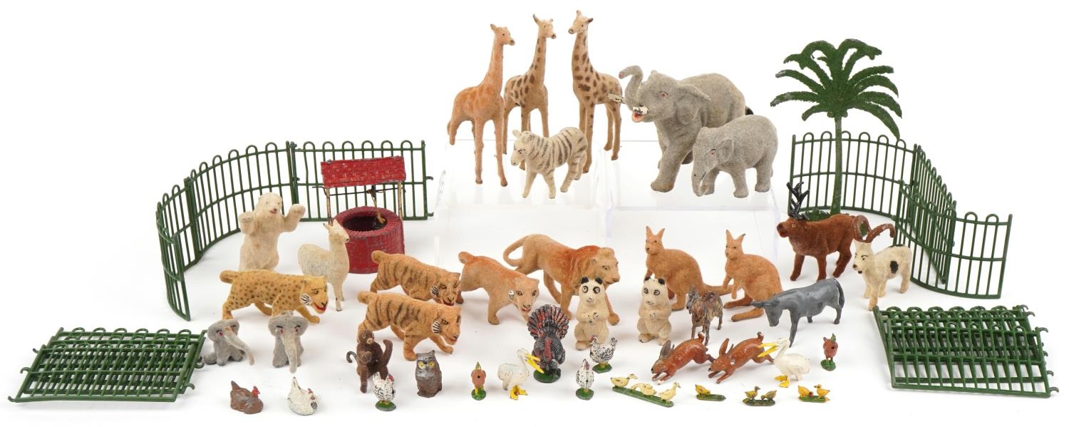 Selection of lead zoo animals including an elephant, wishing well and palm tree, the elephant 11cm