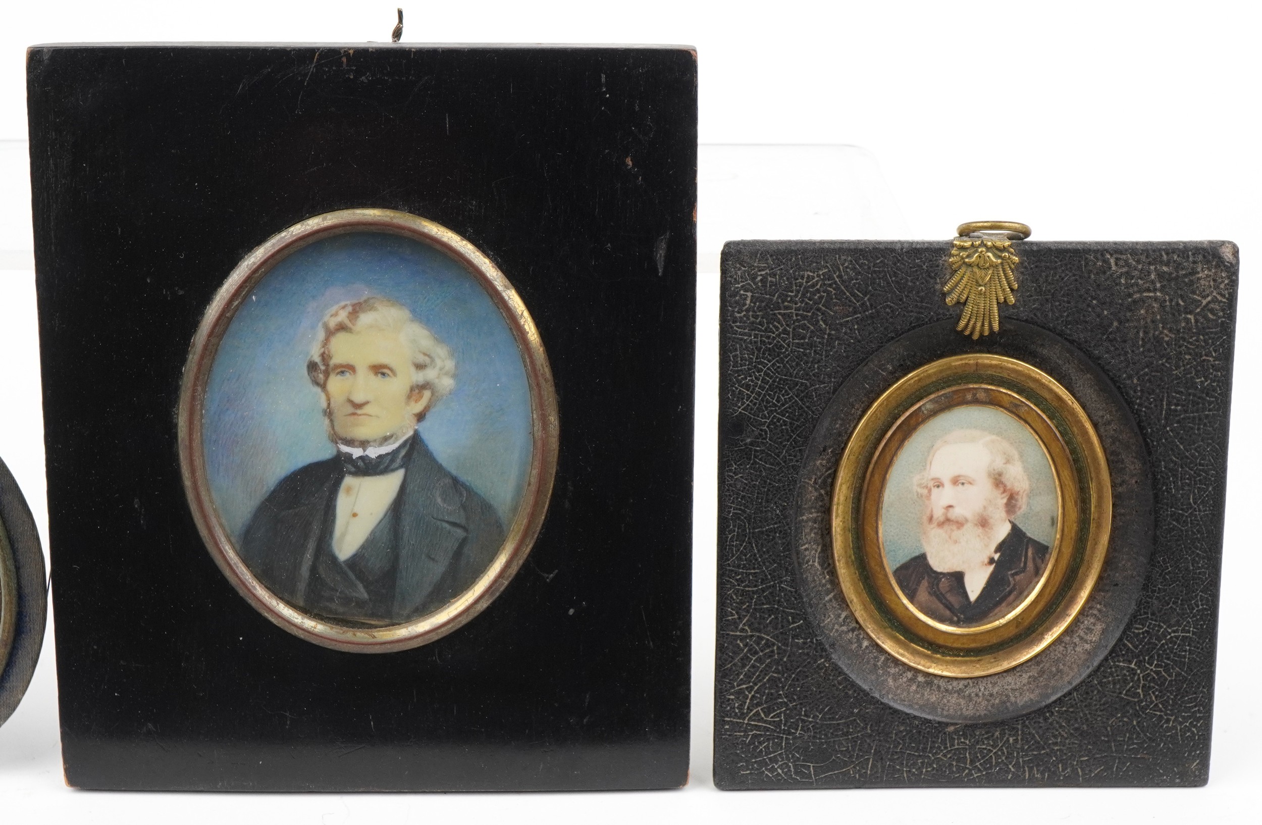 Four hand painted portrait miniatures and photographs, two housed in ebonised frames, including an - Image 3 of 4