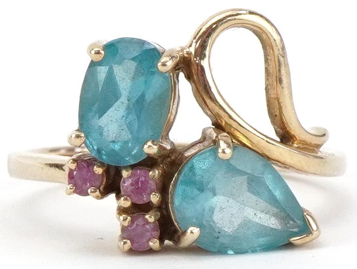 9ct gold blue and pink spinel crossover ring, size N, 3.7g