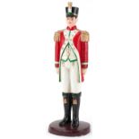 Hand painted cast iron figure of a soldier, 40cm high