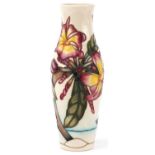 Moorcroft pottery vase hand painted and tubelined in the the Frangipani Plumeria pattern,