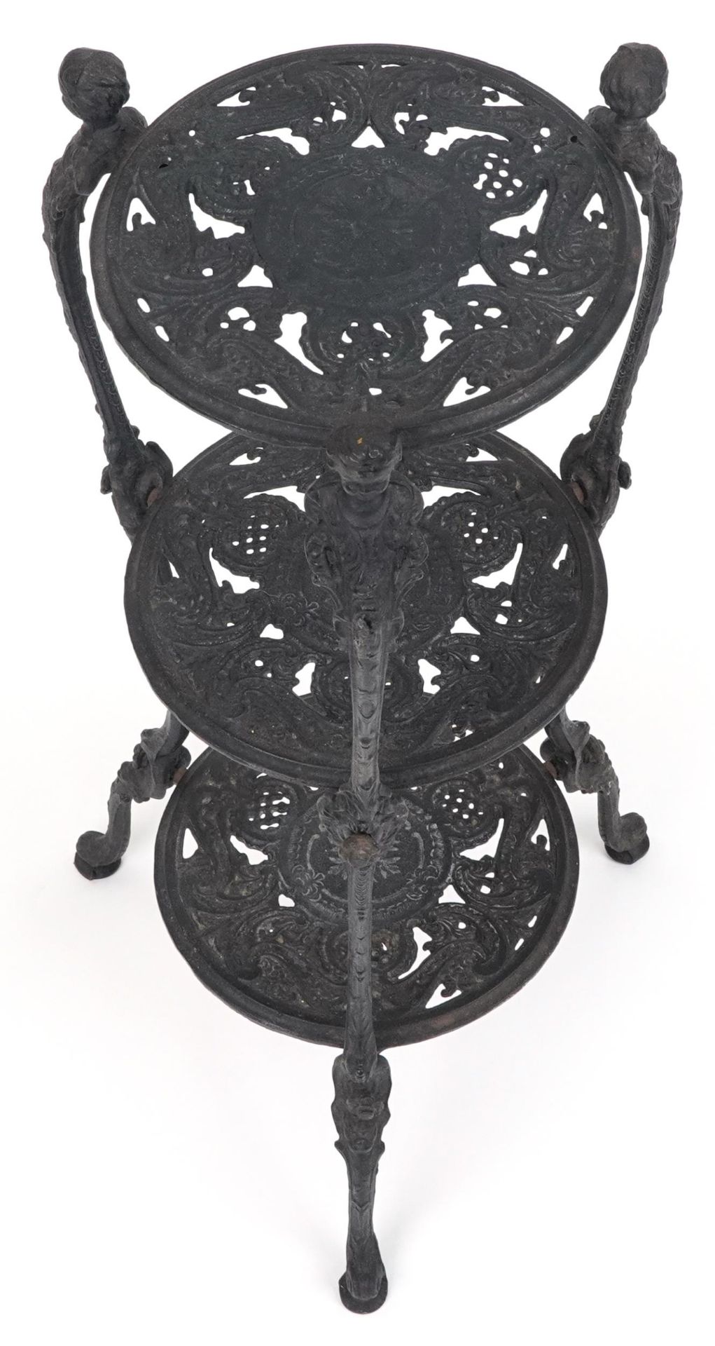 Victorian style cast iron three tier plant stand with figural mounts, 74cm high - Image 3 of 6