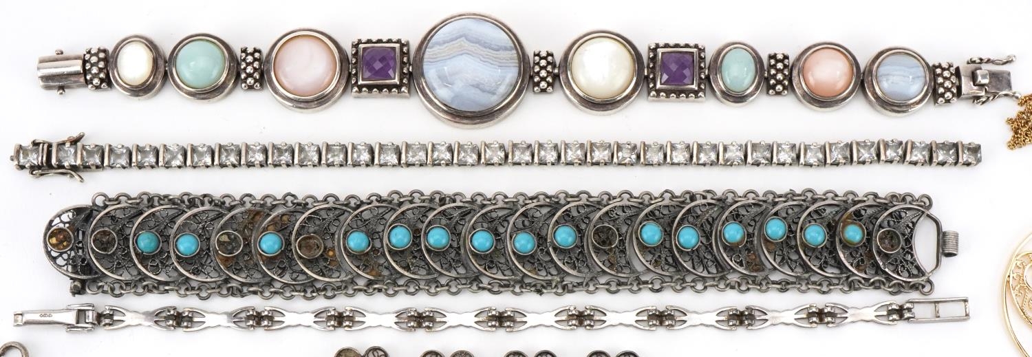 Vintage and later silver and white metal jewellery including a charm bracelet, floral engraved - Image 2 of 5