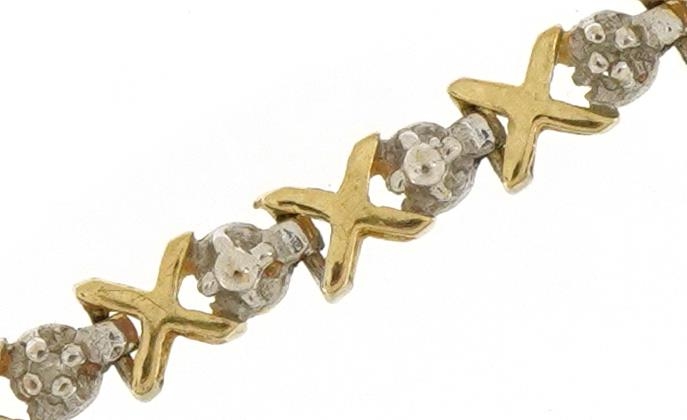 9ct two tone gold diamond line bracelet, 18cm in length, 3.5g