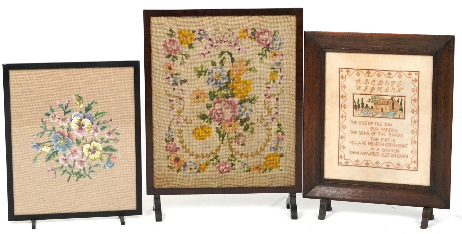 Three tapestry fire screens, the largest 70cm high x 53cm wide