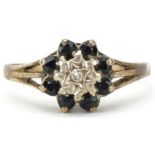 9ct gold diamond and blue spinel flower head ring, size S, 2.5g
