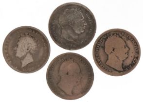 Three George III silver shillings and a George IV silver shilling