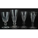 Four 18th century wine glasses, the largest 13.5cm high