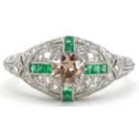 Art Deco style platinum champagne diamond, white diamond and emerald cluster ring, the central