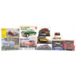 Collection of diecast and model kit vehicles with boxes including Corgi, Spirit, Carrera Evolution