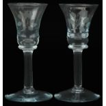 Near pair of wine glasses etched with Jacobite roses, each 15cm high