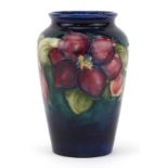 Moorcroft pottery vase hand painted and tubelined in the Anemone pattern, 12.5cm high