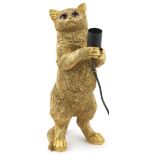 Ornate gilt painted table lamp in the form of a standing cat, 40cm high