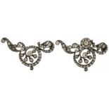 Two continental antique 800 grade silver paste brooches, each 6cm wide, total 41.7g