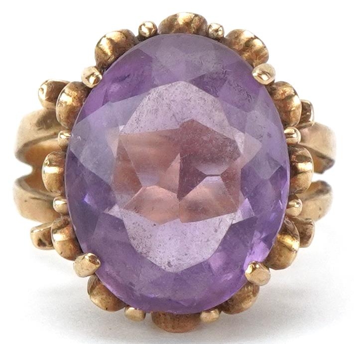 9ct gold amethyst cocktail ring with split shoulders, the amethyst approximately 15.40mm x 12.40mm x