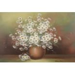 Nancy Lee - Oil of on canvas daisies in a vase in an ornate gilt frame, 75cms x 50cms excluding