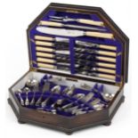 Art Deco oak six place canteen of Sheffield silver plated cutlery, some with ivorine handles, the