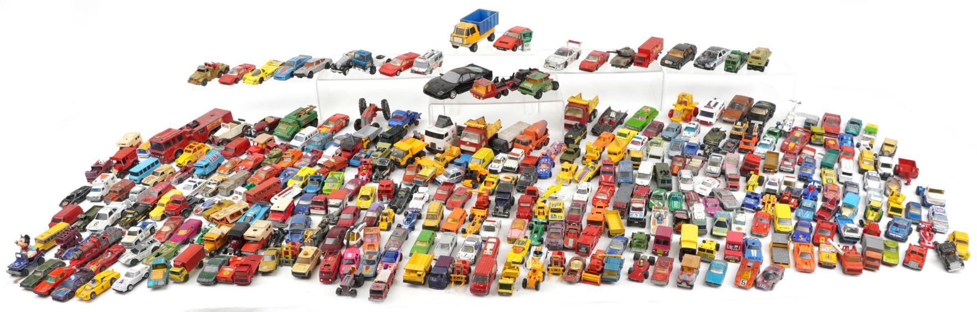 Extensive collection of vintage predominantly diecast and tinplate vehicles including Tonka,