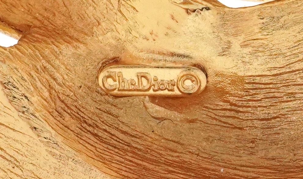 Christian Dior, gold plated and clear stone brooch in the form of palm leaves, 6.5cm high, 30.0g - Image 3 of 3